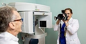 Patient receiving dental x-ray imaging procedure.