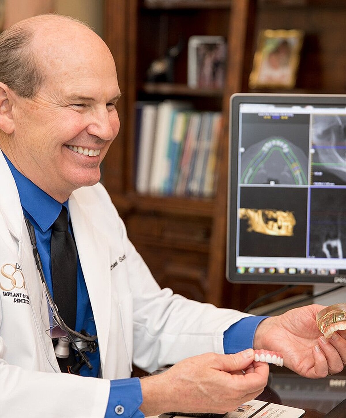 Patient smiling during dental check-up.