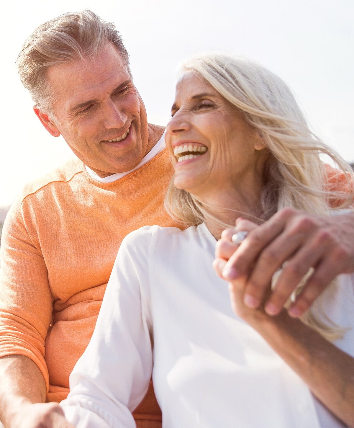 Smiling doctor in a dental office setting.