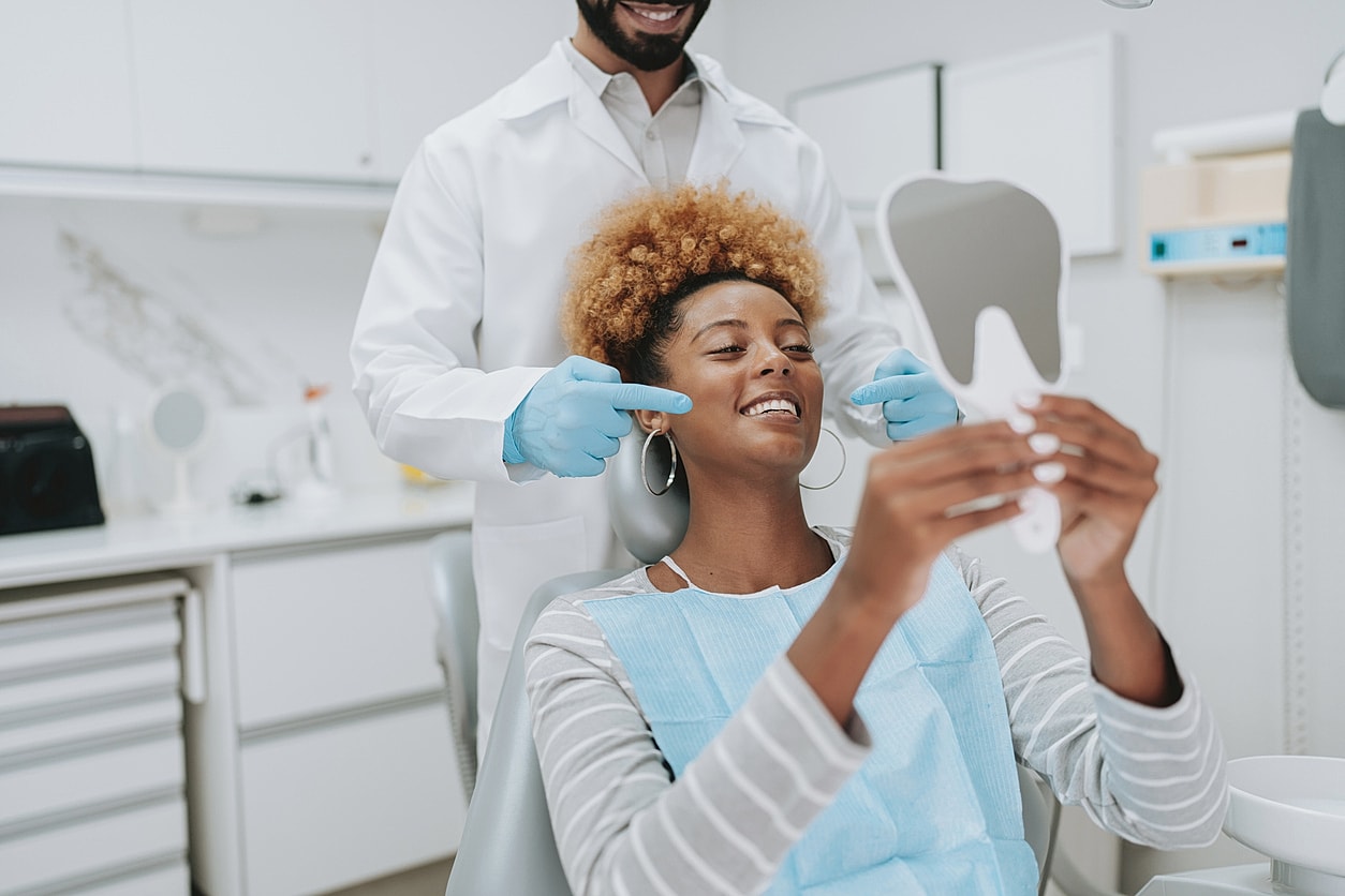 Patient enjoying dental check-up in clinic.