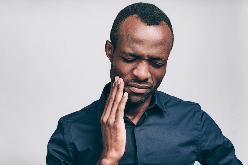 Man with tooth pain